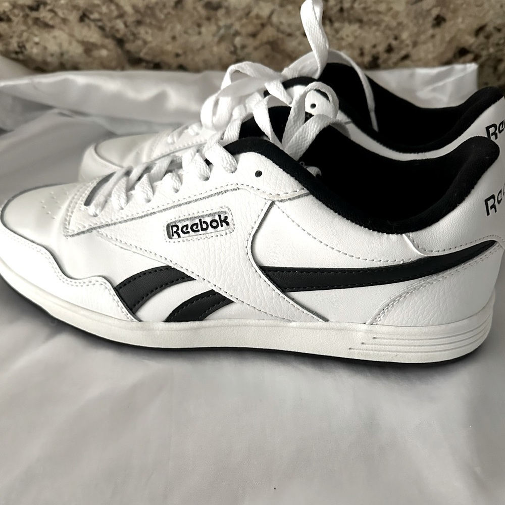 NWOT. Reebok Women’s Court. Black and White. Size 10.